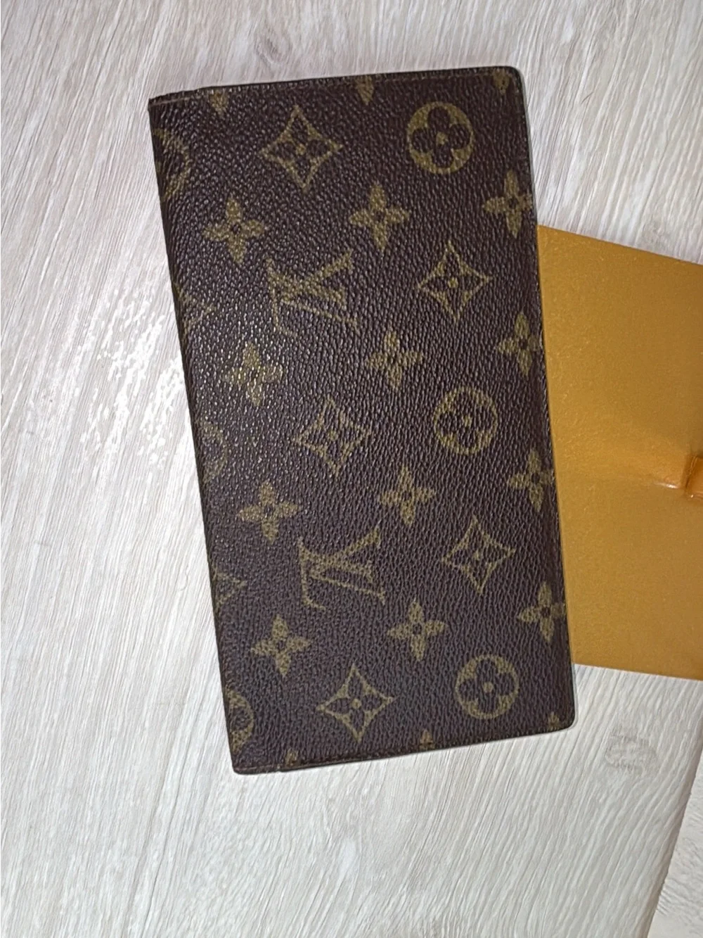 1984 Louis Vuitton authenticated long checkbook wallet